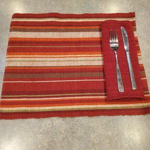 Red multi striped placemats and cloth napkins